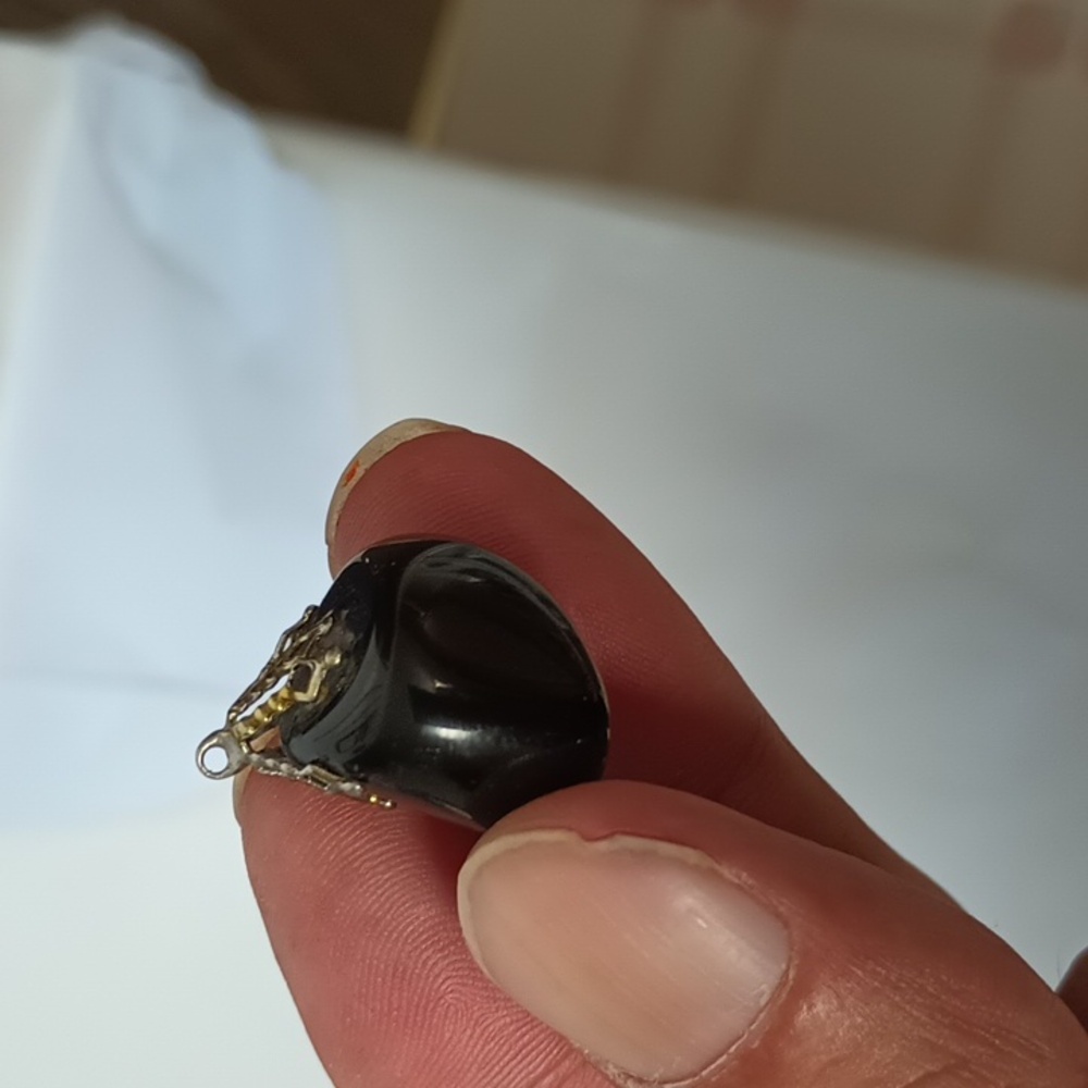 Black pendant with crows feet hanger